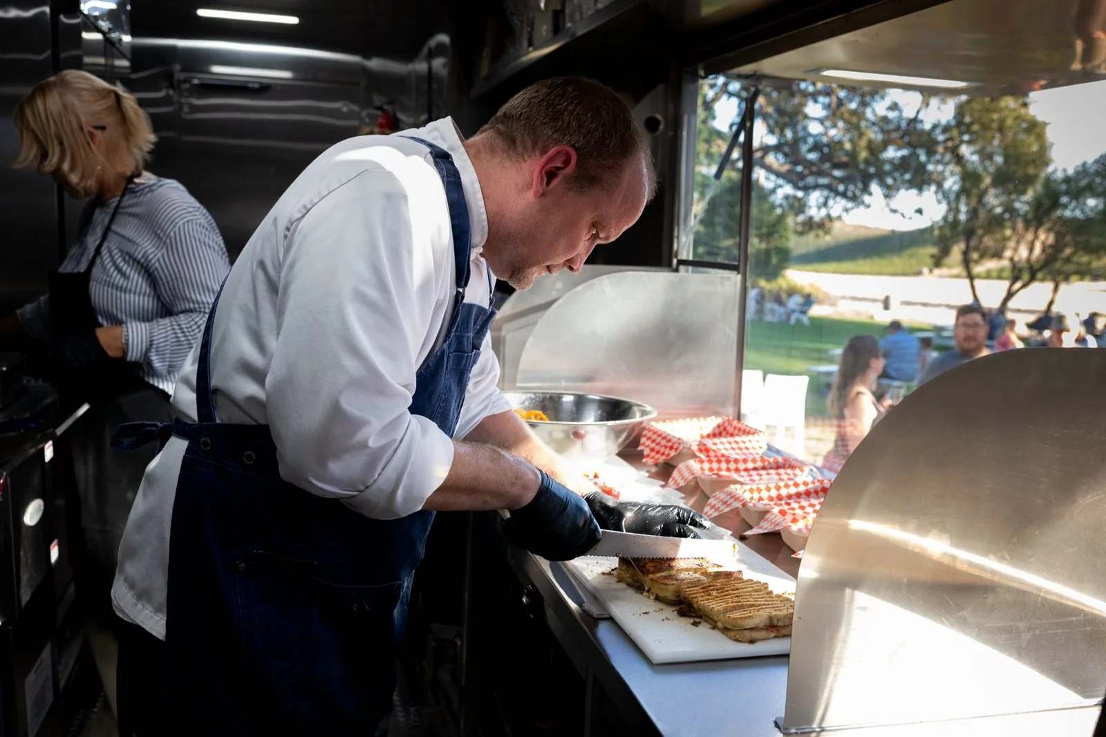 Natale Koch working the HWYCAFE serving window at Peachy Canyon Winery
